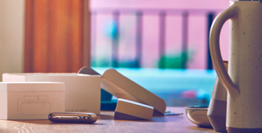 IQOS device and accessories on a table